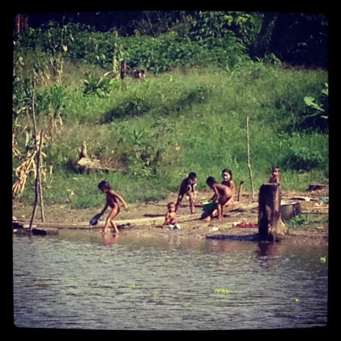 Children bathing in the river - sorry it's grainy, but I only had my cell phone for a camera at the time