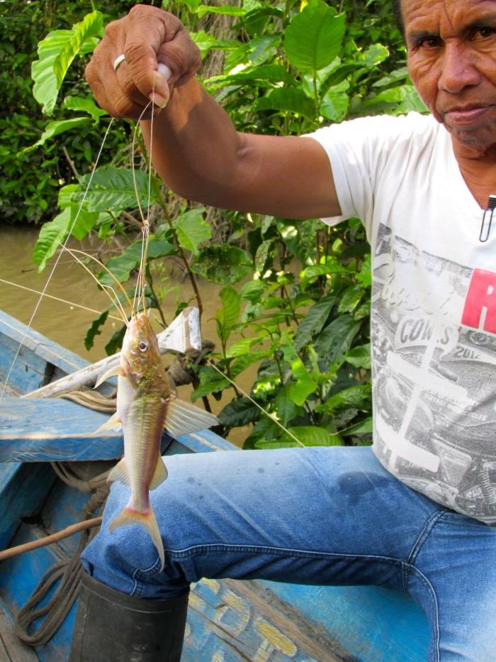 Aníbal with a fish he caught